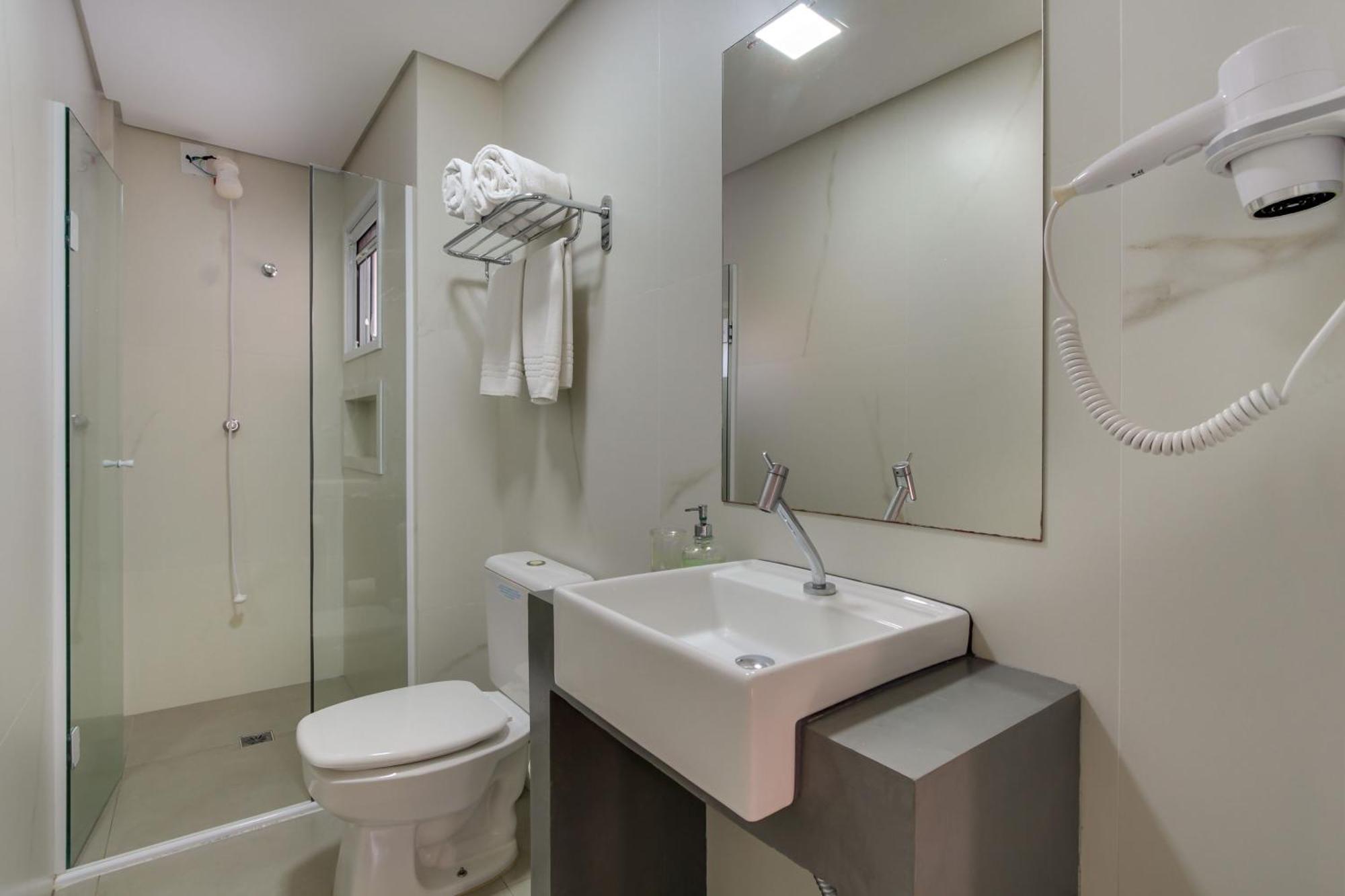 Апартаменты Residencial Casa Flora Бомбиньяс Номер фото